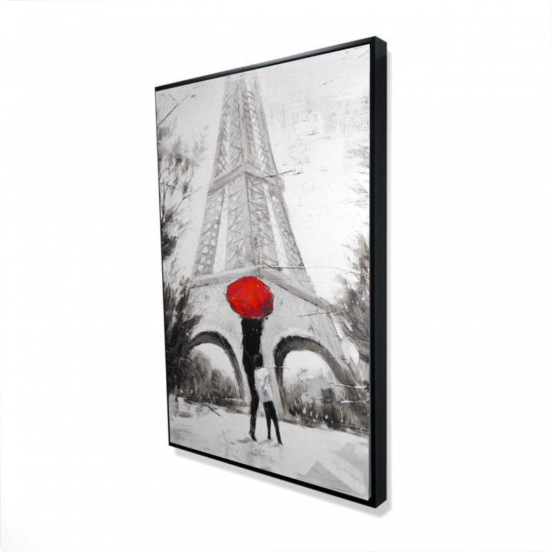 "Femme avec son enfant devant la tour Eiffel"