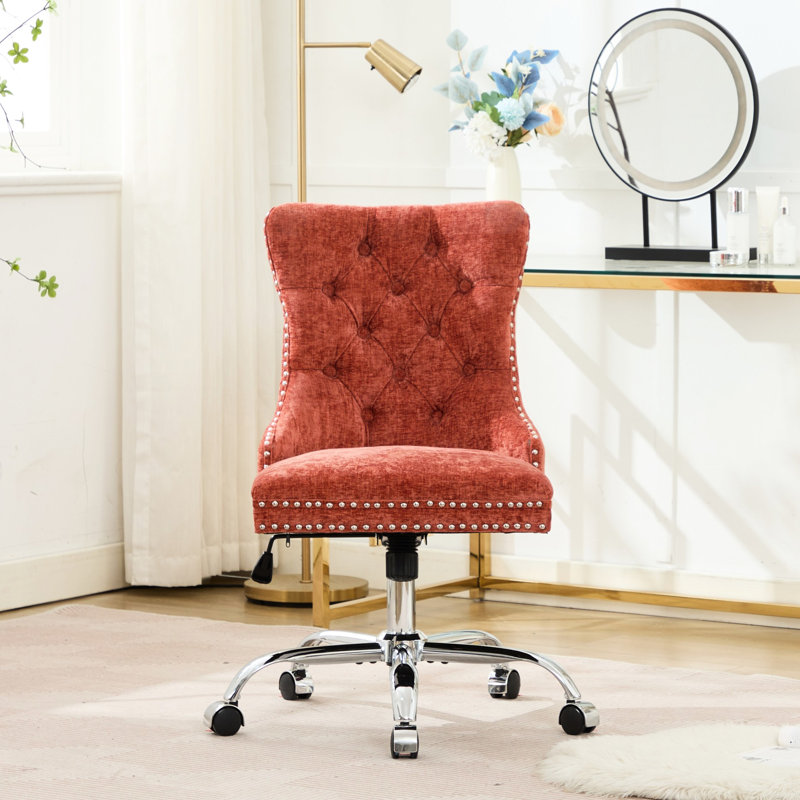 Chaise de bureau orange moderne, revêtement en chenille avec boutons, base en métal, pivot réglable, coussin à rebond élevé, garniture cloutée décorative tirée à la main, confortable pour étude en éponge