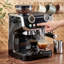 Machine à espresso avec broyeur à vapeur intégré