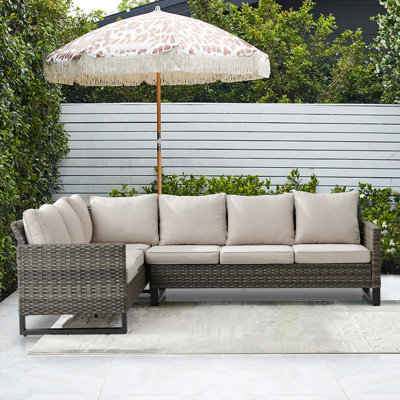 Naresa Wide Outdoor Wicker Patio Sectional with Cushions by Ebern Designs