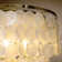 Aslak Tiered Antique Bronze Capiz Flush Mount Ceiling Light with Shell Accents