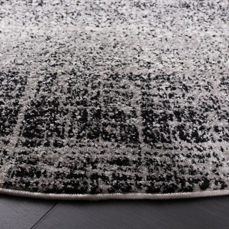 Riebe Abstract Silver/Black Area Rug, Round 6'