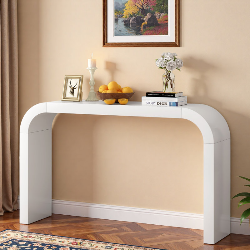Console moderne minimaliste avec structure stable et silhouette arrondie