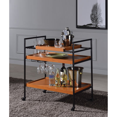 Table de service réglable en chêne miel et noir, support à verres à pied inclus, 3 compartiments de rangement ouverts, 4 roulettes pour faciliter le déplacement, structure en métal robuste, mobilier de salle à manger