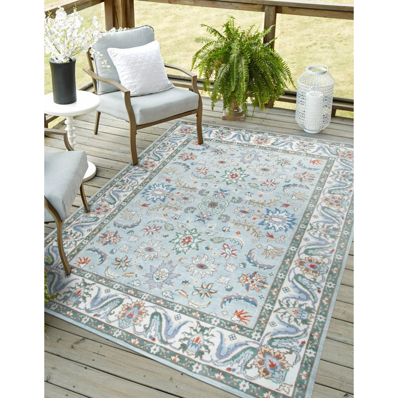 Tapis bleu élégant en laine noué à la main