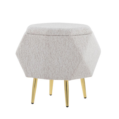 Pouf de rangement en tissu gris pâle avec pattes en métal doré