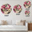 Horloge murale à motif roses roses sur fond jaune-314803286