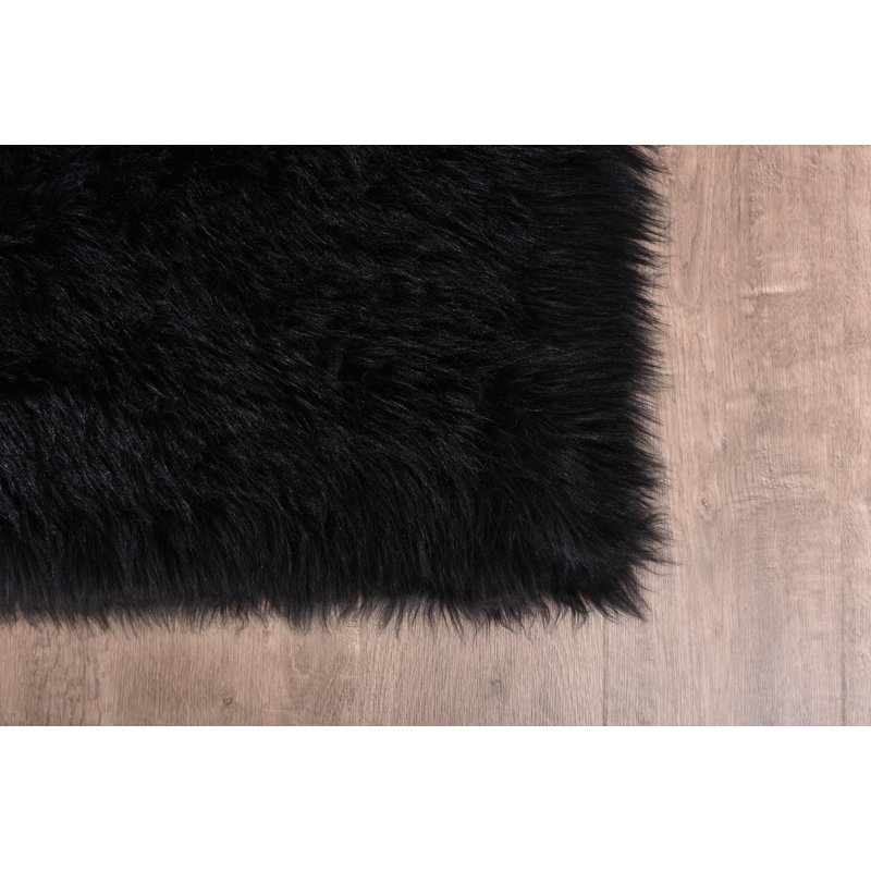Jeremial Faux Sheepskin Indoor Rug, Round 5'