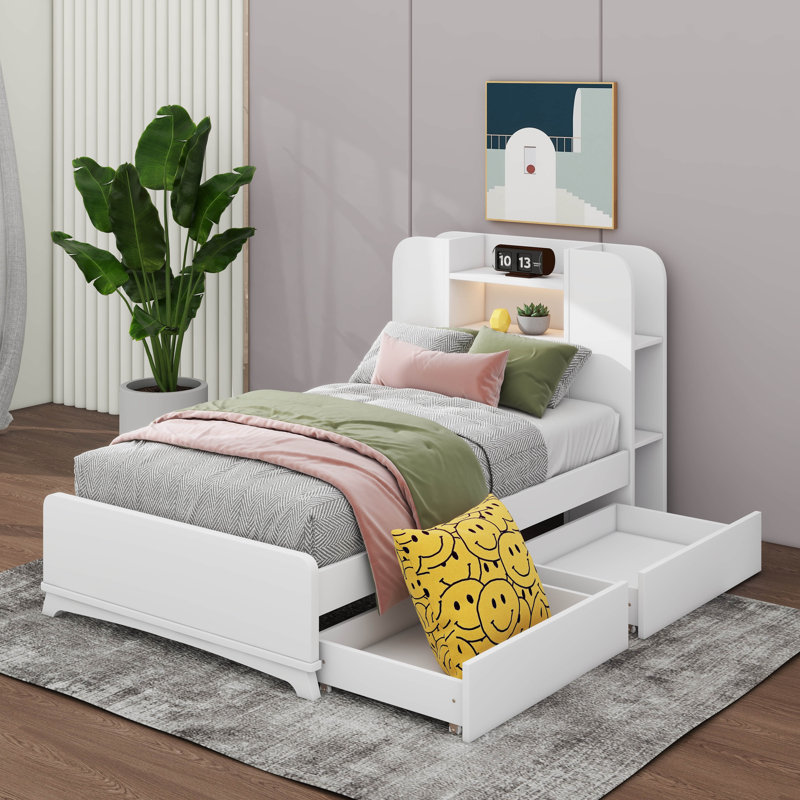 Une base de lit simple avec deux tiroirs et une tête de lit ornée d'une bande lumineuse, Blanc