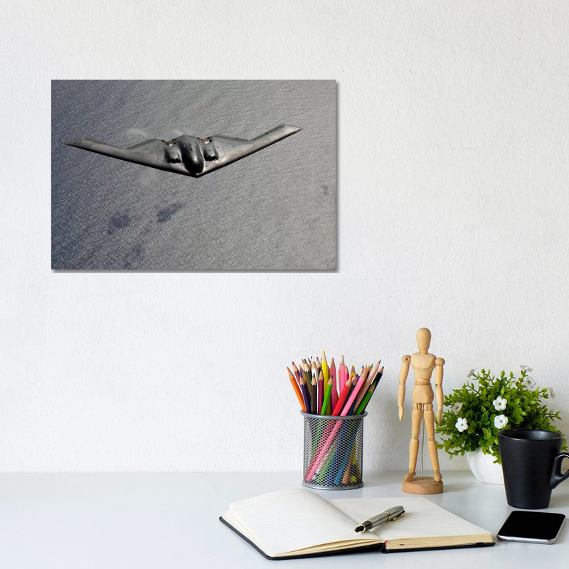 A B-2 Spirit Flies Over The Pacific Ocean - Wrapped Canvas Print, 20.32 cm H x 30.48 cm W