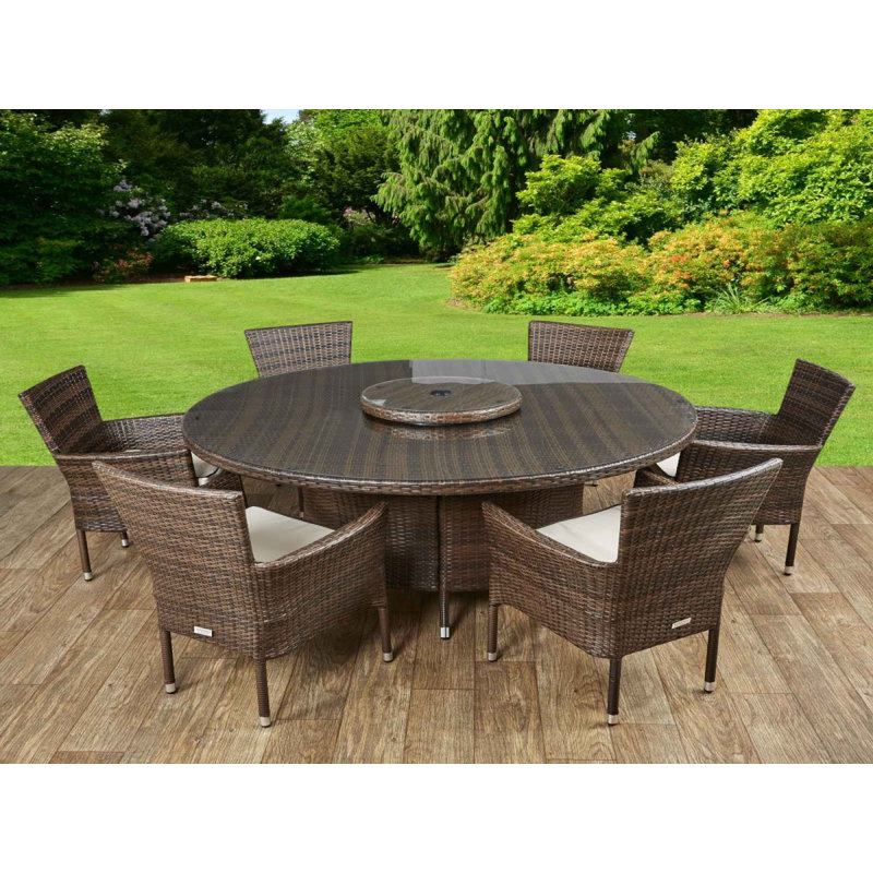 Copenhaver 6 - Person Patio Dining Set with Round Table , Cushions Included, Chocolate/Cream