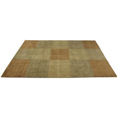 Wasif Area Rug in Brown