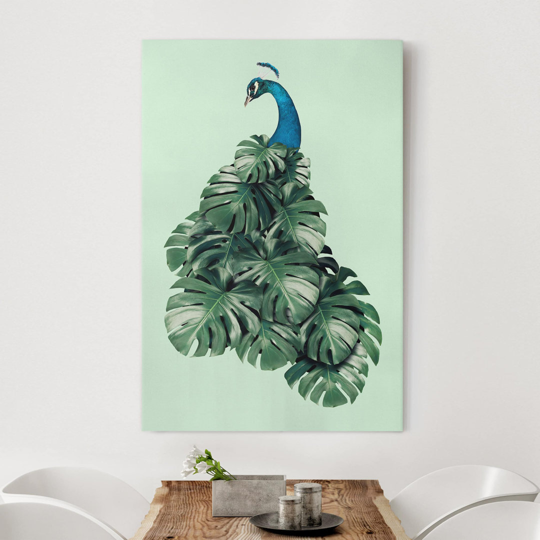 Leinwandbild Pfau mit Monstera-Blättern von Jonas Loose