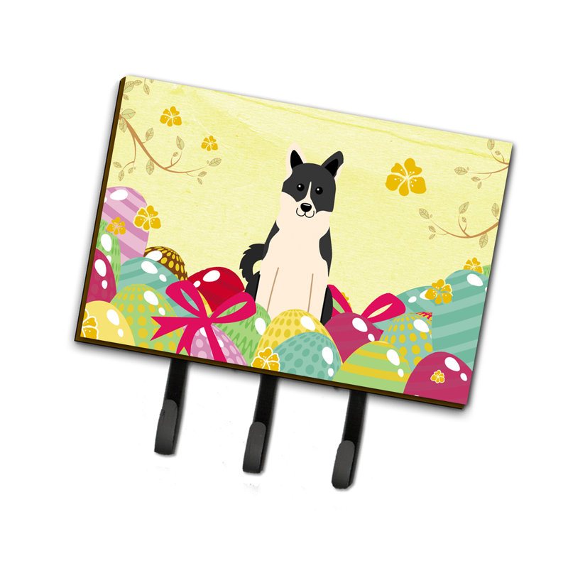 Russo-european laïka-spitz ou porte-clé de pâques œufs