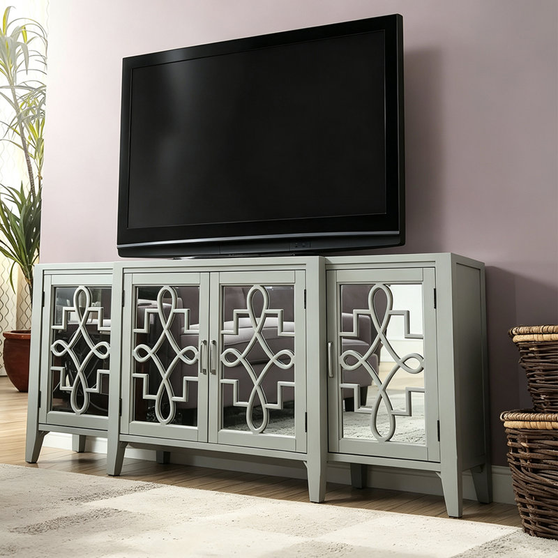 Meuble télé gris pâle avec portes d'armoire à motif géométrique et miroir