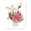 Hortensia et renoncule disposés en pot en céramique