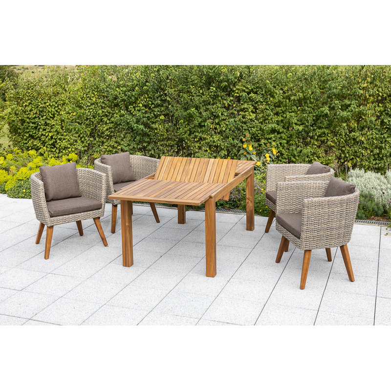 Lanora 4 - Person Patio Dining Set Rectangular Table with Cushions Included