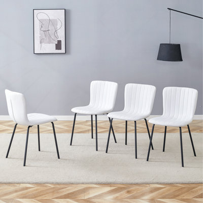 Chaises de luxe minimalistes - un ensemble de 4 chaises de salle à manger de haute qualité. La structure des pieds en métal intégrée convient à divers styles de décoration intérieure.