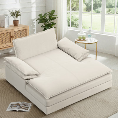Chaise longue avec coussin moelleux et accoudoirs larges