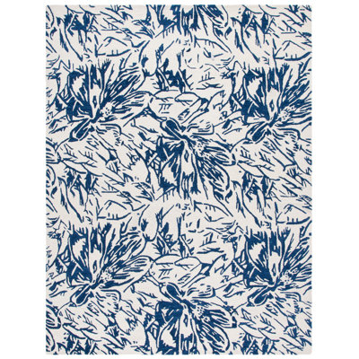 Romon Hand Tufted Wool/Cotton Floral Rug in Ivory/Blue