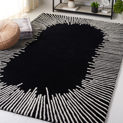 Tapis noir / ivoire en laine / coton touffeté à la main Jarie