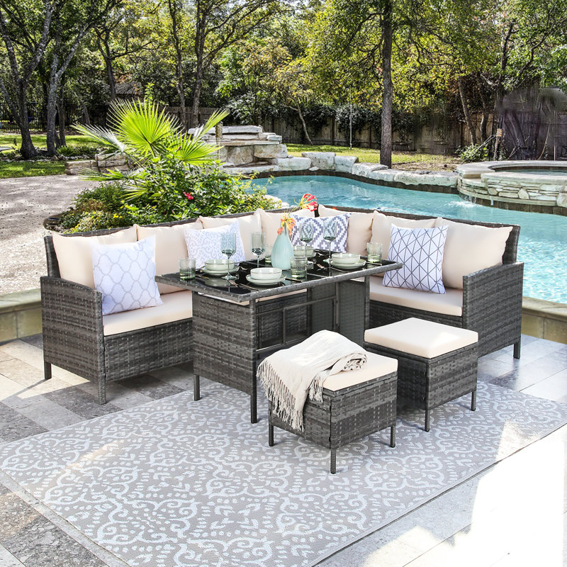 Everill Rattan Wicker 9 - Person Seating Group with Cushions