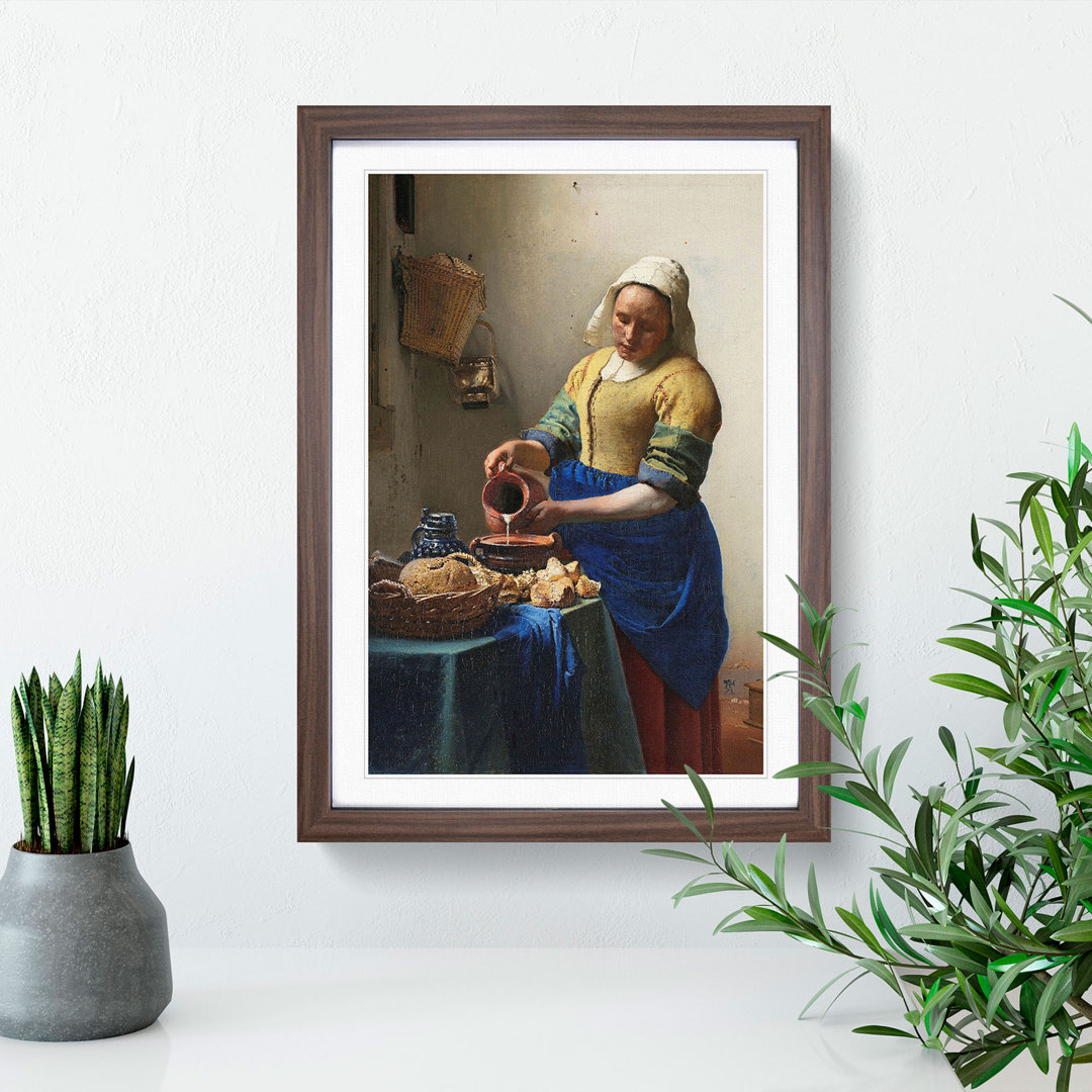 The Milkmaid by Johannes Vermeer - Framed Print