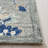 Saguenay Micro-Loop Hand Tufted Wool/Cotton Floral Rug in Blue-1700321921