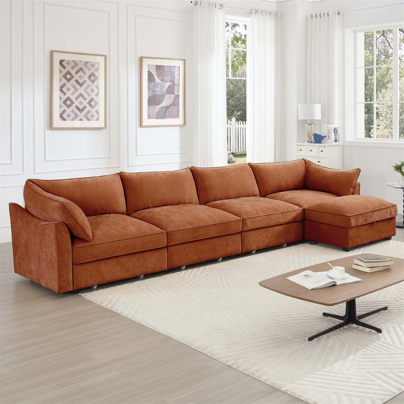 Canapé modulaire en L à 4 places avec repose-pieds mobile, accoudoirs en forme de croissant et coussins enveloppants en tissu chenille