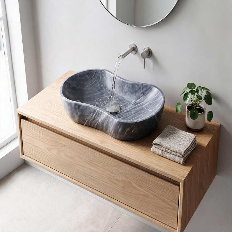 Vasque de salle de bain en marbre naturel gris de Carrare semi-poli, forme ondulée, 61 cm x 36 cm, silhouette artistique