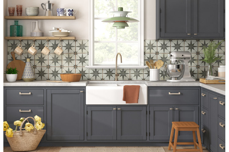 Kitchen with Slate blue cabinets white countertop floating star patterned back splash and floating shelves for kitchen organization