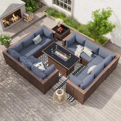 Ensemble de conversation modulaire en rotin Babak avec foyer et table basse