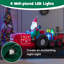 Père Noël conduisant un tracteur gonflable