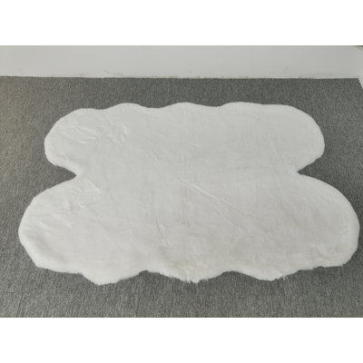 Tapis blanc en fausse fourrure Modena