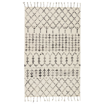 Esposito Geometric Area Rug in Ivory/Black