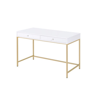 Bureau blanc laqué lustré avec 2 tiroirs et pattes dorés, plateau d'écriture au design élégant