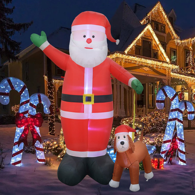 Chien gonflable Père Noël et Labrador