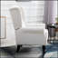 Fauteuil à oreilles confortable avec coussins capitonnés et accoudoirs arrondis pour un style de vie élégant-624937872
