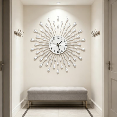 Grande horloge murale Modern Starburst, horloge décorative silencieuse en métal 19,7 pouces pour le salon, la chambre à coucher, la cuisine et la salle à manger, argent