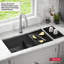Évier de cuisine encastré à double cuve en acier inoxydable noir de calibre 16 Delta Rivet ™ L 33 po