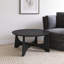 Table basse noire en bois-563889171