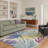 Abrahamson Verdant Tropical Machine Washable Beige / Green / Blue / Purple Indoor Area Rug with Non-Slip Backing-128992201