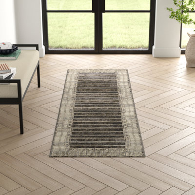 Tapis rayé gris anthracite et ivoire pour l'intérieur et l'extérieur Boden