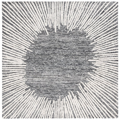 Tapis noir / ivoire en laine / coton touffeté à la main Janyla