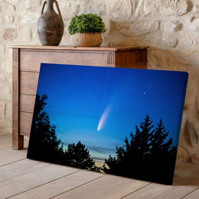 Canvas A Breathtaking Night Sky Scene Featuring A Vibrant Comet Soaring Wall Art Through A Deep Blue Twilight The Comet S Luminous Canvas Wall Art