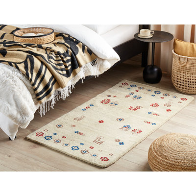 Carmaletta Geometric Wool Hand Woven Area Rug