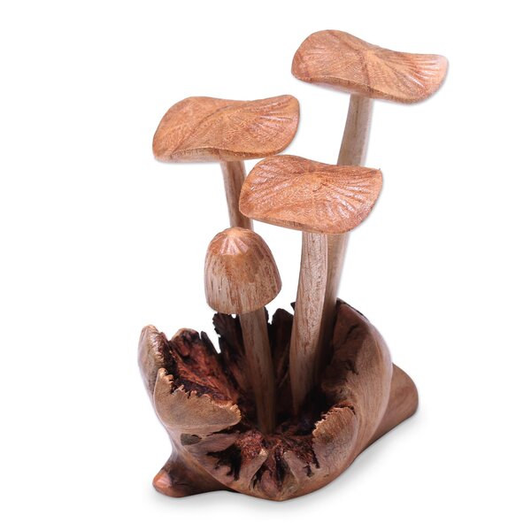 Handmade Wooden Mushrooms on Wood Log