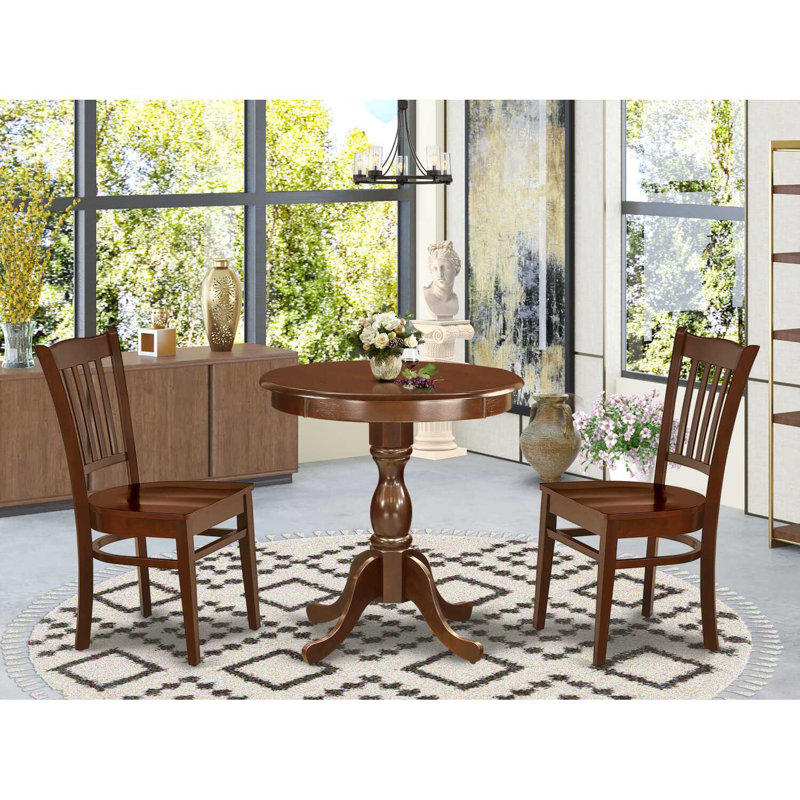 L'ensemble de salle à manger 3 pièces comprend une table de salle à manger ronde avec piédestal et 2 chaises de cuisine, acajou