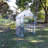 Gulianna 4.5' x 2' x 6.5' Outdoor Portable Walk-In Greenhouse with 4 Shelves with a Clear Cover