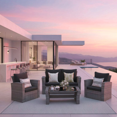 4-Piece Wicker Patio Conversation Set With Glass Table And Cushions
